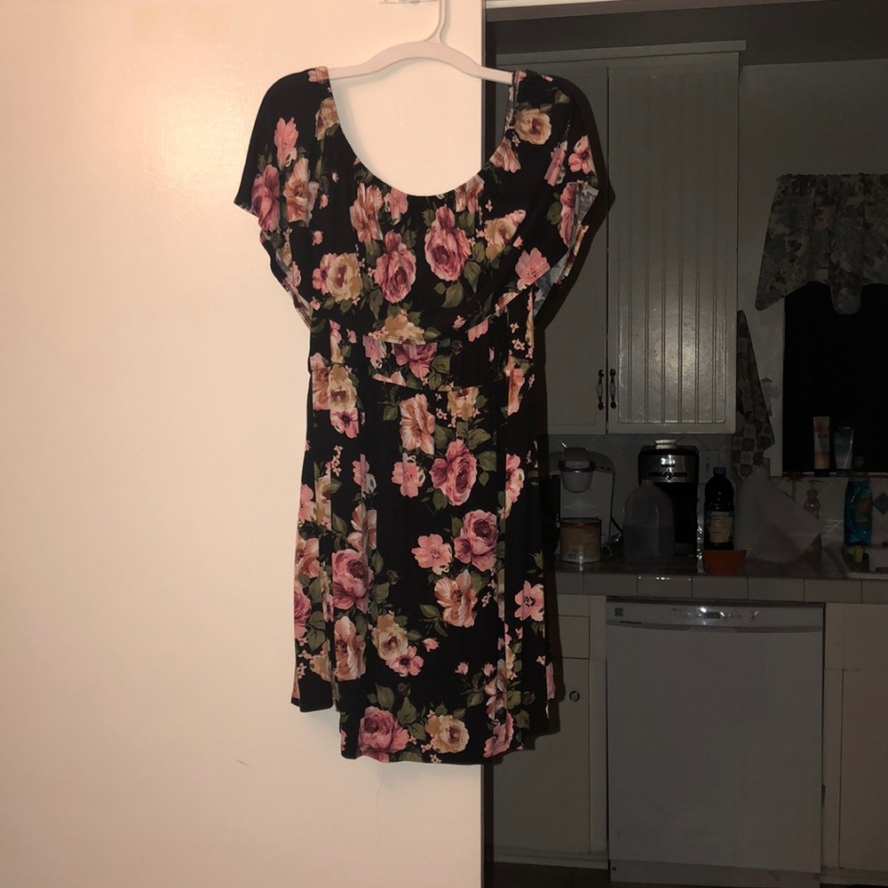 Maternity shirt with flowers on it